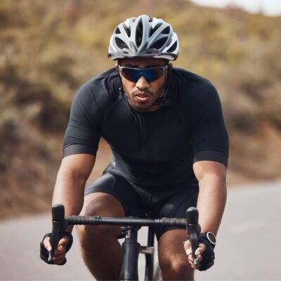 man cycling with helmet